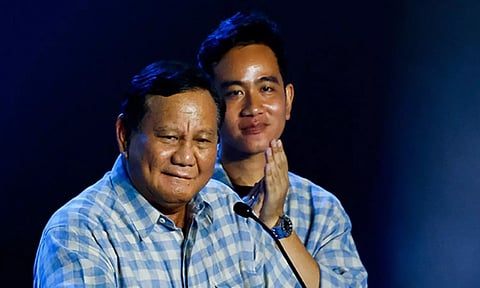 Indonesia Defence Minister Prabowo Subianto with his running mate Gibran Rakabuming Raka (Reuters)