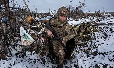A Ukrainian soldier takes his position on the frontline near Klishchiivka the Donetsk region, Ukraine. (AP)