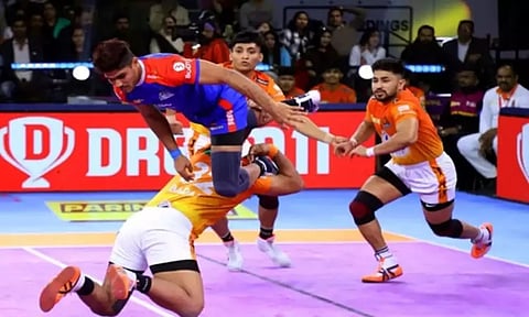 Pawan Sehrawat goes for a raid against U Mumba