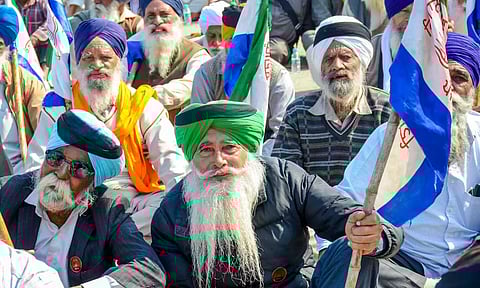 Farmers burn effigies during the 'Black Day' protest at the Punjab-Haryana Shambhu border, in Patiala district on Friday. (PTI)