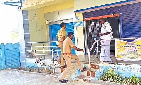 Police arrive to investigate a failed theft attempt at ATM kiosk in Tiruchy on Friday