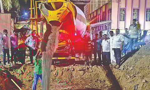Work in progress to lay concrete foundation for the installation the AIADMK leaders’ statues at the new location in Gudiyattam