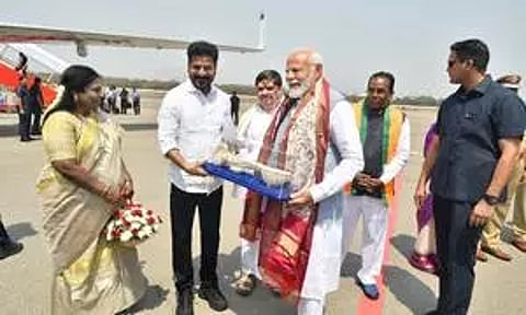 Telangana Chief Minister A. Revanth Reddy presenting a memorandum to Prime Minister Narendra Modi