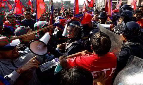 Protestors clashing against police. Reuters