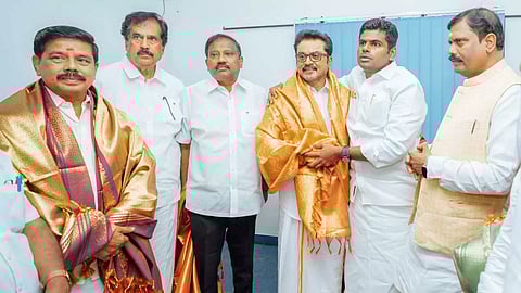 Sarath Kumar merges AISMK with the BJP (X: @annamalai_k)
