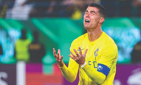Cristiano Ronaldo reacts after his side's exit
