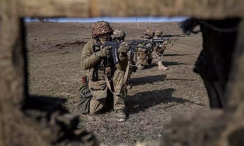 Ukrainian servicemen of 79th brigade take part in training (Reuters)