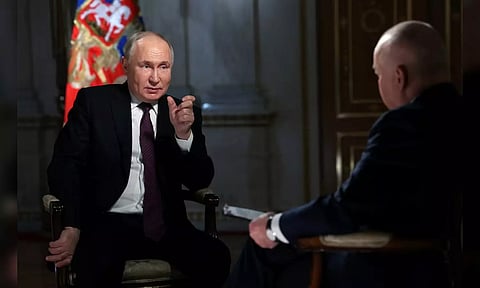 Putin attends a Kremlin meeting (REUTERS)