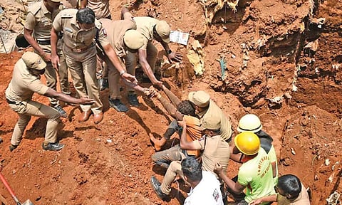 Fire and Rescue Services personnel rescuing trapped workers in The Nilgiris on Wednesday 
