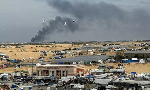 Smoke rises during an Israeli ground operation in Khan Younis March 