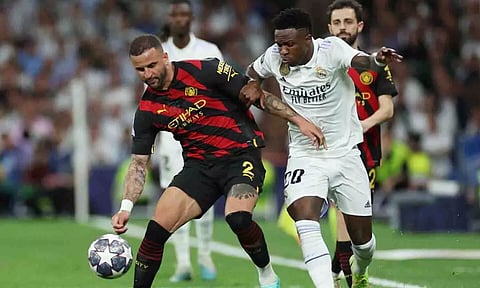 Kyle Walker and Vinicius Jr (Reuters)