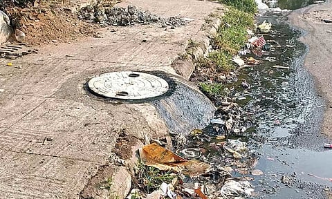A pool of sewage on the road