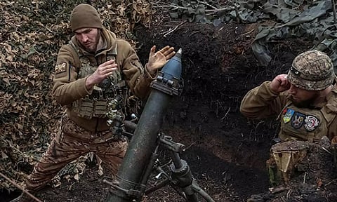 Ukrainian servicemen fire a mortar towards Russian troops at a frontline near the town of Bakhmut (ANI)