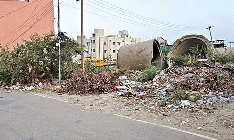 Cement pipes and mounting debris in the locality