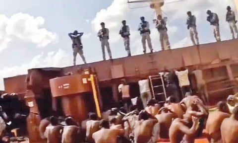 Indian Navy commandos, called MARCOS, With the surrendered pirates