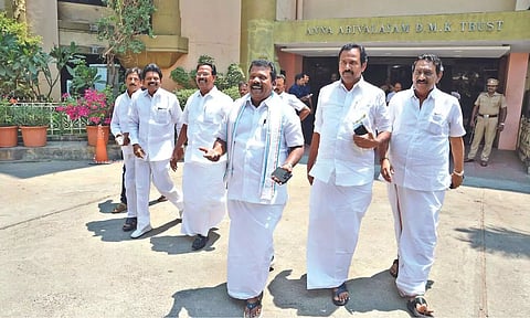 TNCC president K Selvaperunthagai and other leaders coming out of DMK headquarters in Chennai on Monday 