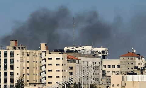 Smoke rises during an Israeli raid at Al Shifa hospital in Gaza City (Reuters)