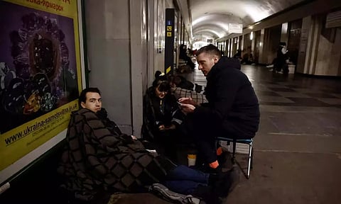 People take shelter in a metro station during a Russian missile strike (Rueters)