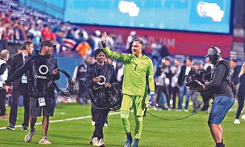 Costa Rica’s Keylor Navas waves to fans after his team’s qualification