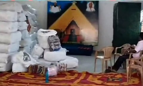 The cloth bundles seized by the election department in Erode.