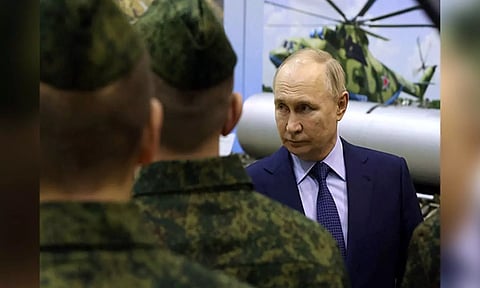 Russian President Vladimir Putin meets with military pilots in Torzhok (Reuters)