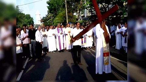 Cross rally by devotees lights up Good Friday in Thiruvananthapuram (Image/ANI)