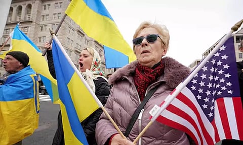 Ukraine supporters protest against Russia's invasion of Ukraine during a demonstration near the White House in Washington (Reuters)