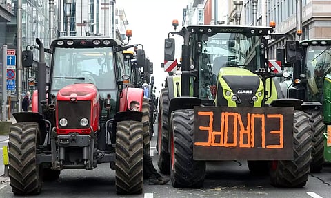 Tractors stand on a street during a protest by Belgian farmers over price pressures, taxes and green regulation, on the day of an EU agriculture ministers' meeting in Brussels, Belgium March 26, 2024. (REUTERS)