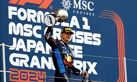 Max Verstappen at the podium of the Japanese Grand Prix (Reuters) 
