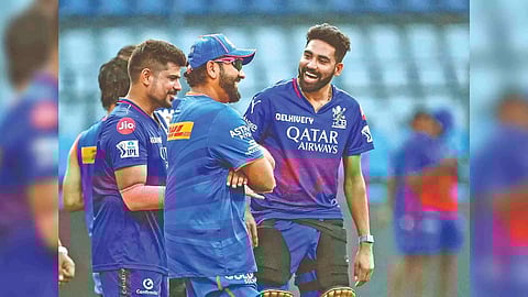 Rohit Sharma and Mohammed Siraj during a practice session