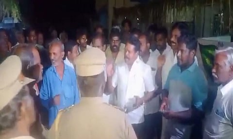 Police officials at Ettarai village in Trichy on Friday night (ANI)