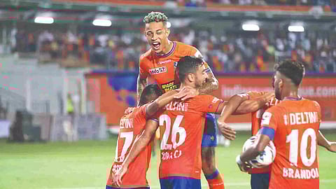 FC Goa players celebrate after their win