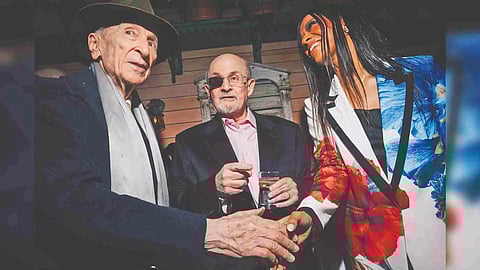 Three security guards stood along a leafy street in the West Village