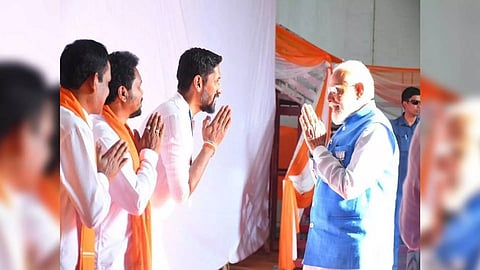 Prime Minister Narendra Modi presented warm welcome by Ram Lalla idol sculptor(Photo/ANI)