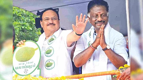 BJP national president JP Nadda with O Panneerselvam during a roadshow in Paramakudi, Ramnad on Tuesday (Photo: Sethu)