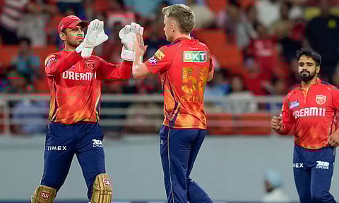Sam Curran celebrates after getting a wicket (PTI)