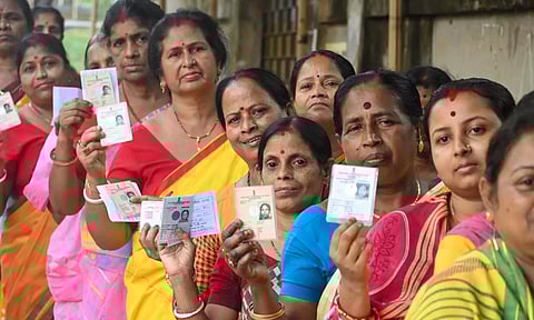 Voters wait to cast their votes