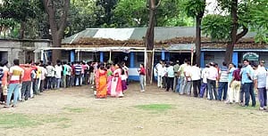 Voters wait to cast their votes