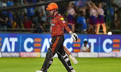 Travis Head walks to the dugout after getting out (PTI)