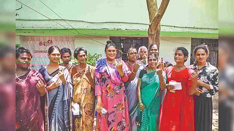 Group of transpersons pose after voting in Choolaimedu