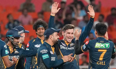 Gujarat Titans players celebrates after a wicket (PTI)