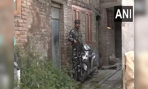 NIA raids nine places in J-K in terror case (ANI)