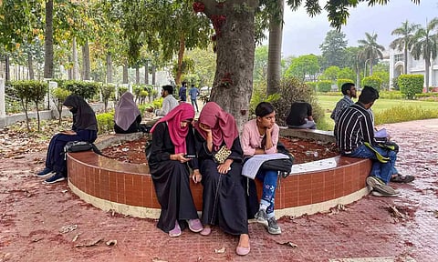 Students at the university garden of the Aligarh Muslim University (PTI)