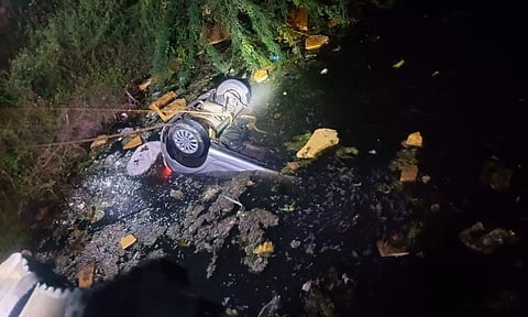 Visual of car plunged into a roadside waterbody at Nedungulam