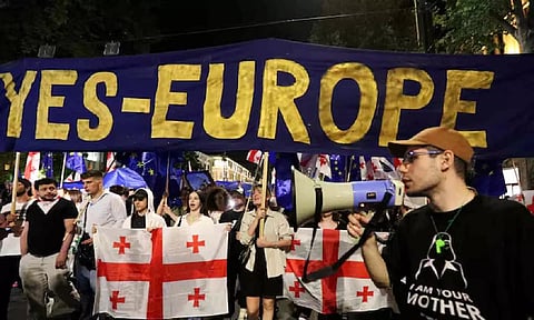 People take part in a protest against a bill on "foreign agents" in Tbilisi, Georgia. (Reuters) 