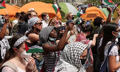 Students march and rally on Columbia University campus (Reuters)