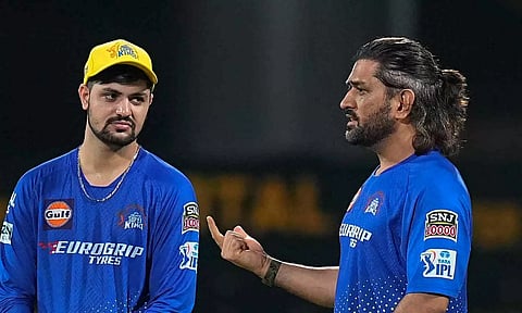  Sameer Rizvi and MS Dhoni in conversation during practice session