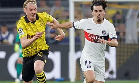 Julian Brandt of Borussia Dortmund, Vitinha of Paris Saint-Germain(IANS) 