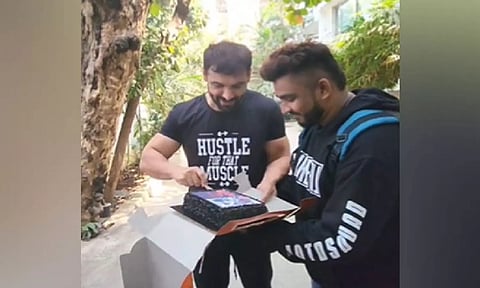 John Abraham with his fan (ANI)