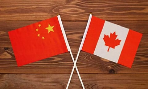 Flag of China and Canada (IANS)